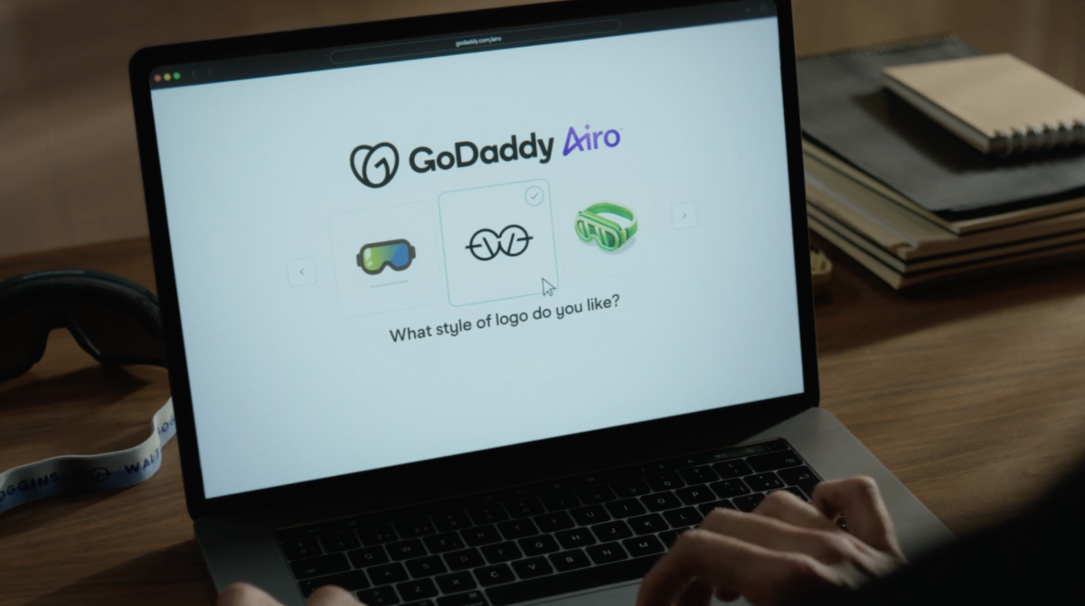 Laptop with GoDaddy Airo on the screen