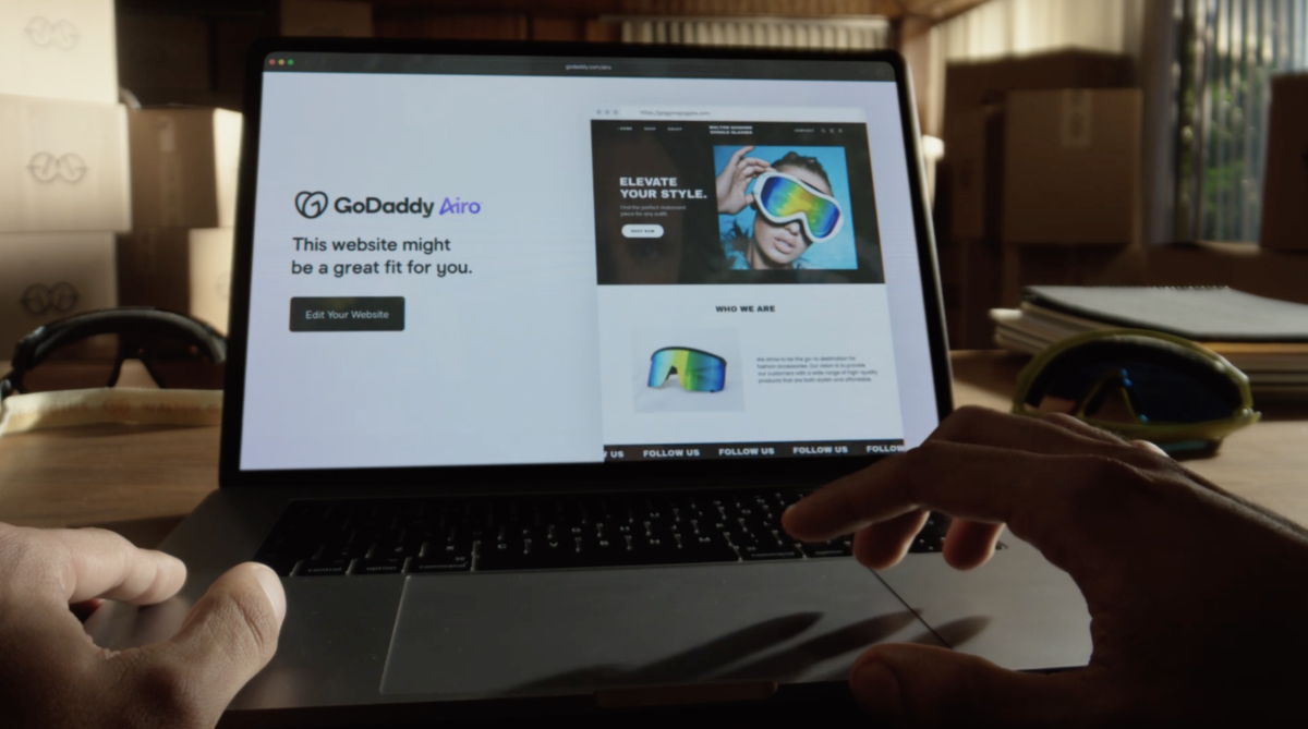 Laptop with GoDaddy Airo on the screen