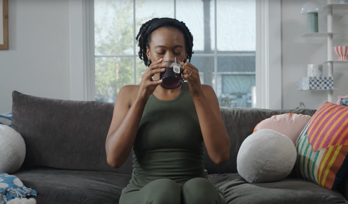 person drinking tea