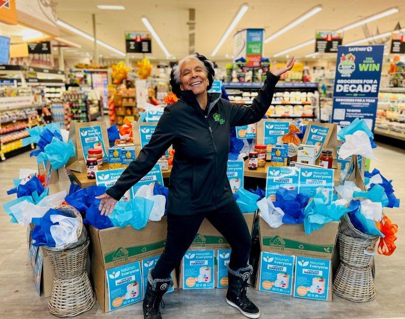 Angela Swanson, president of Feeding Feasible Feasts, poses in Albertsons