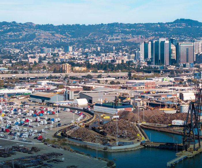 An aerial photo of a shipping yard and neighboring harbor