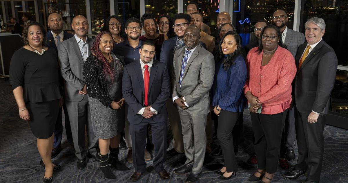 CACI’s 2024 Black Engineer of the Year Awards (BEYA) honorees pictured with CACI President and Chief Executive Officer John Mengucci at the 38th annual Global Competitiveness Conference.