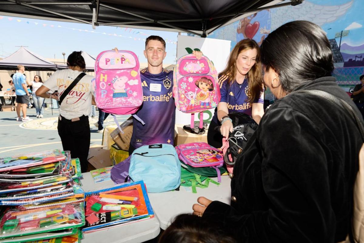 LA Galaxy's Tucker Lepley helped pass out backpacks to students in South Los Angeles.