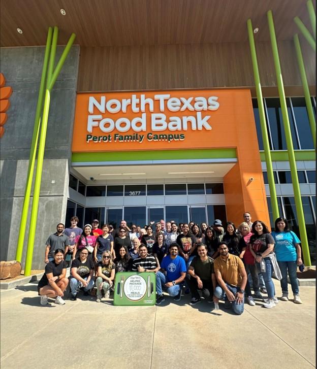 Group of people posing outside North Texas Food Bank