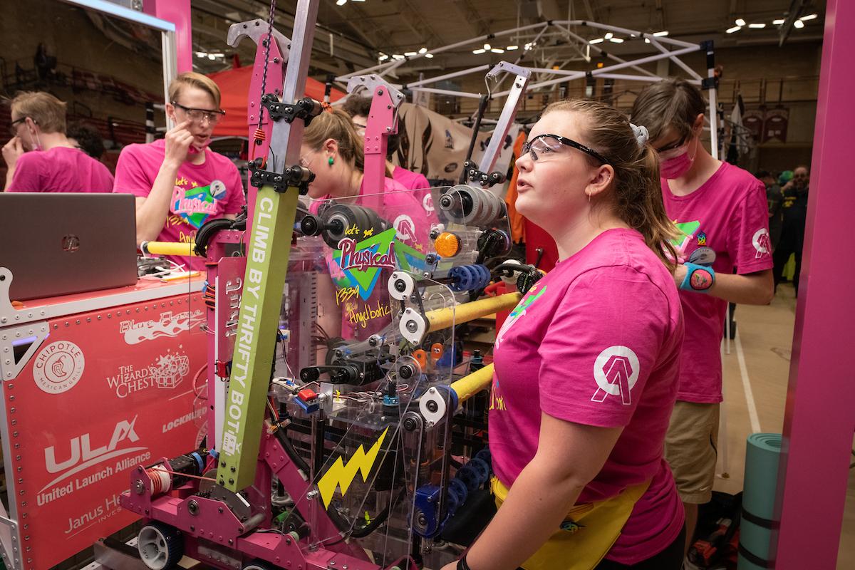 Team of competitors standing with their robot