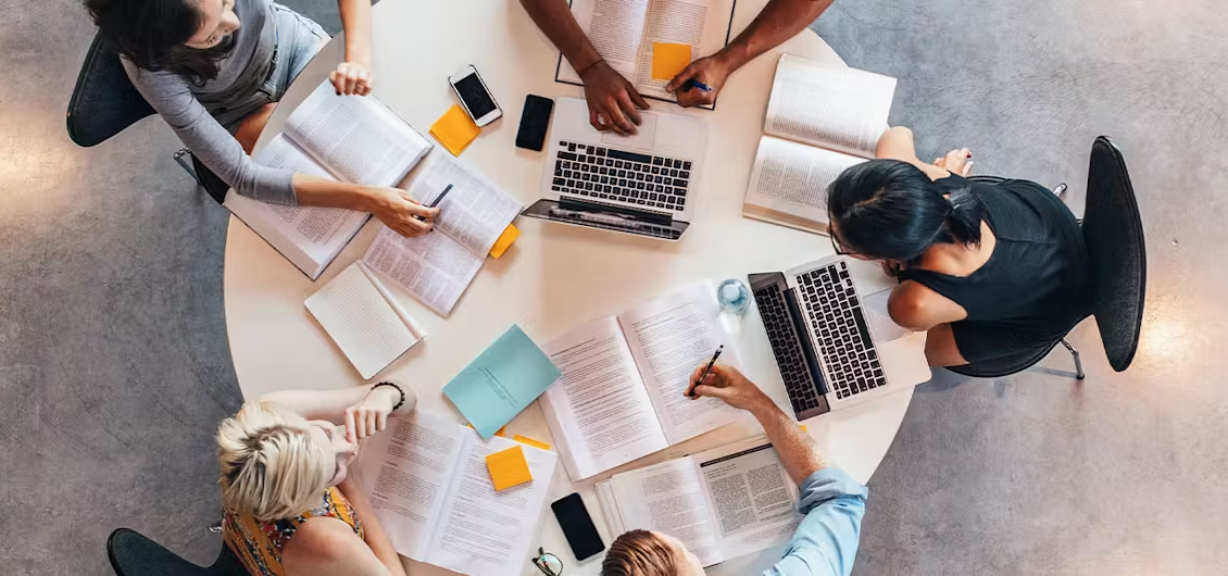 People working together on a round table