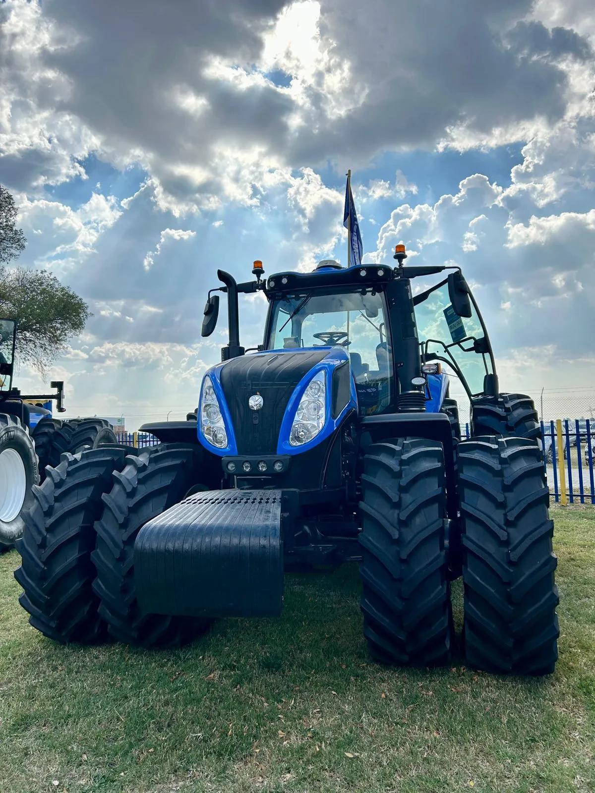 A blue tractor in a field