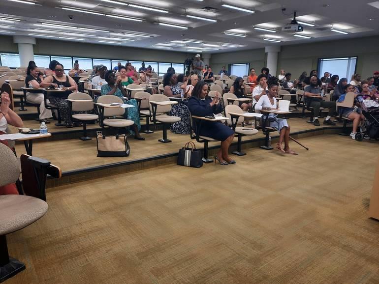 People sitting in chairs.