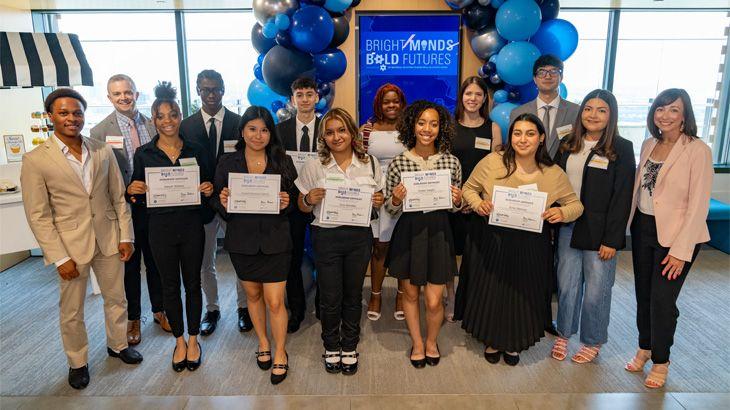 A group of people holding certificate 