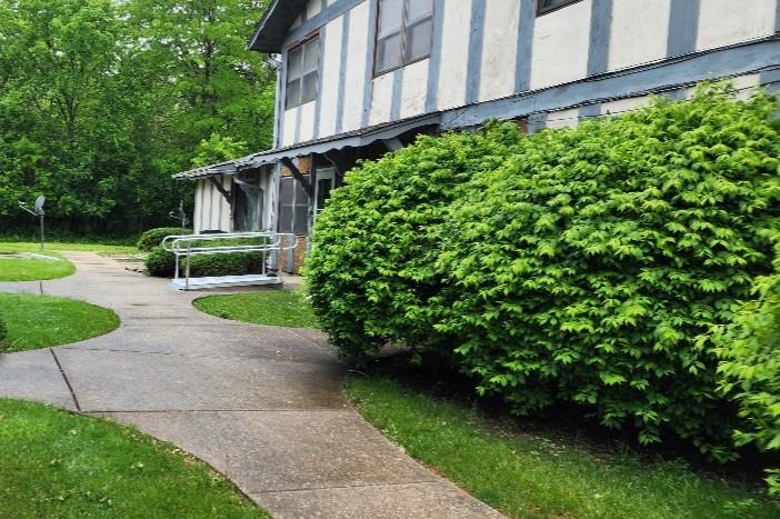 Side view of Ronald's home showing the new wheelchair ramp.