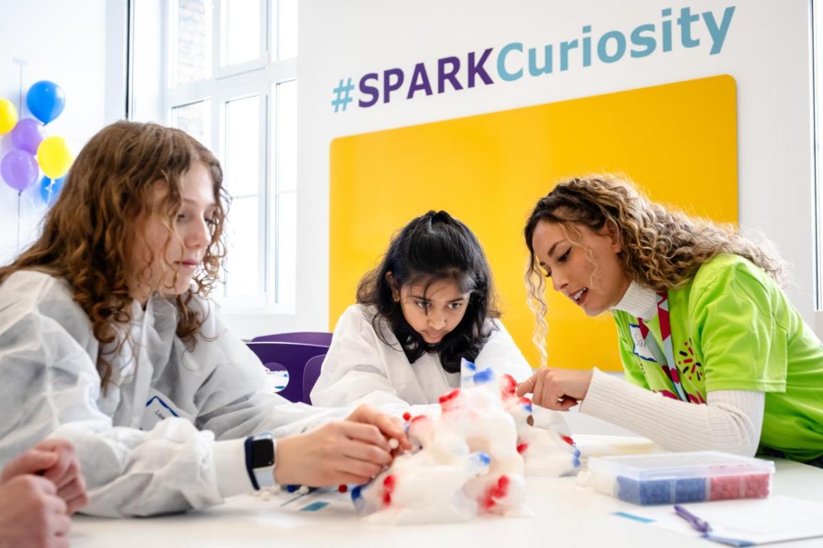 Students working with scientist