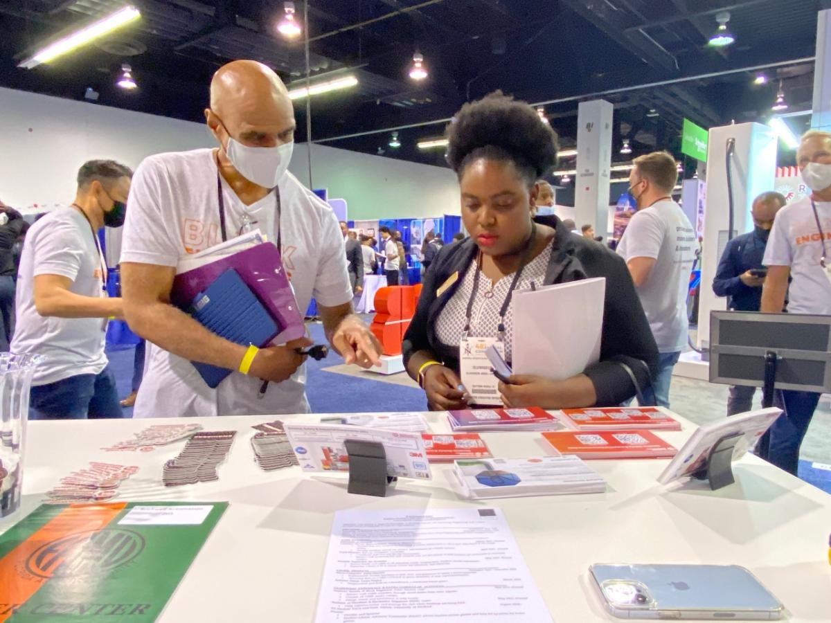 Rockwell’s Derek Gallon chats with a NSBE attendee.