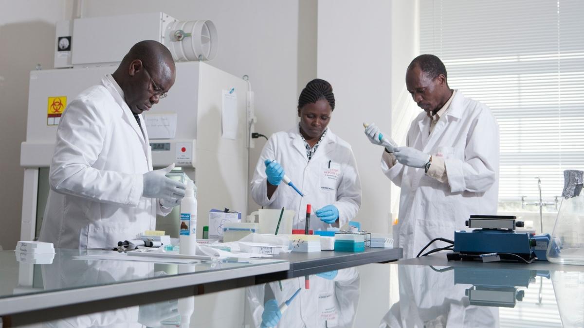 three scientists in lab