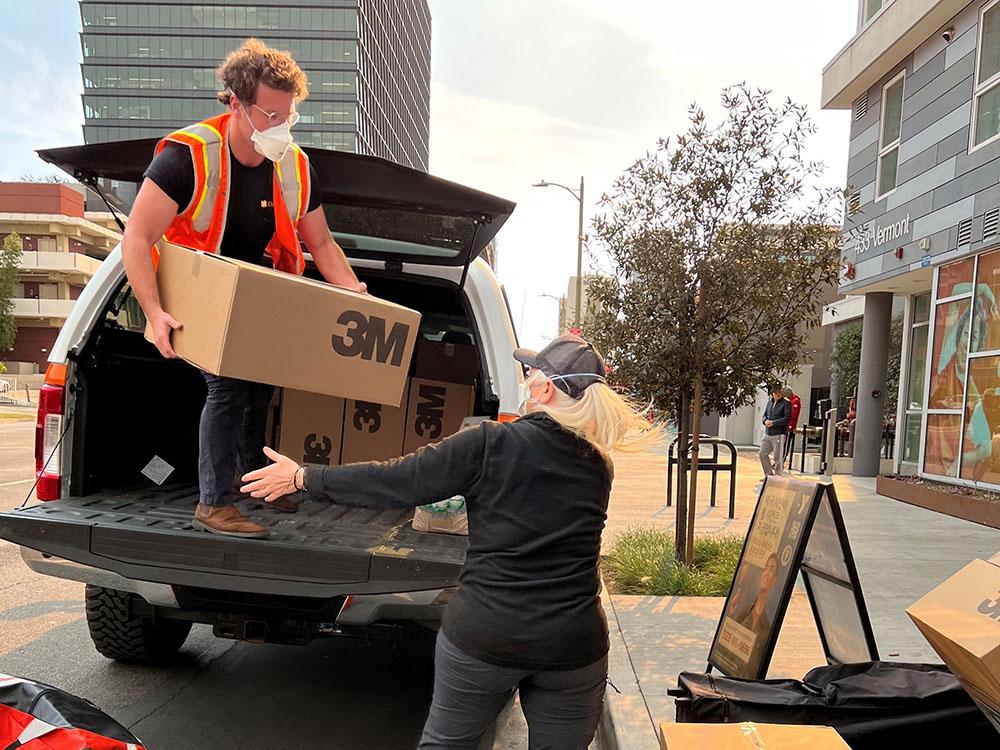 Direct Relief volunteers unloading 3M N95 Respirators in LA.