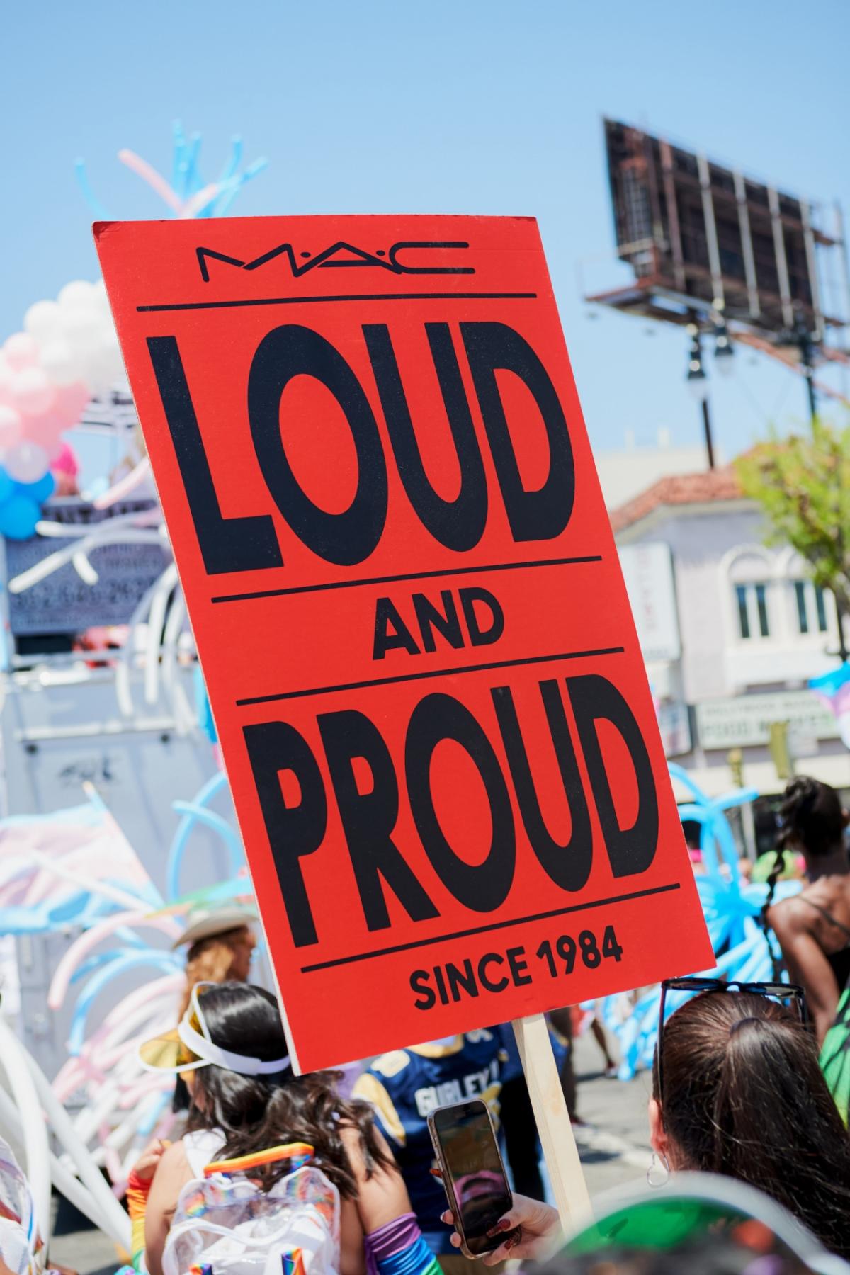 Parade sign: MAC Loud and Proud since 1984