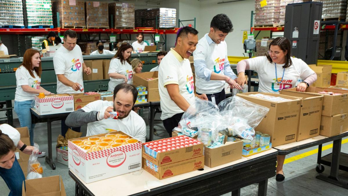 Volunteers packing boxes