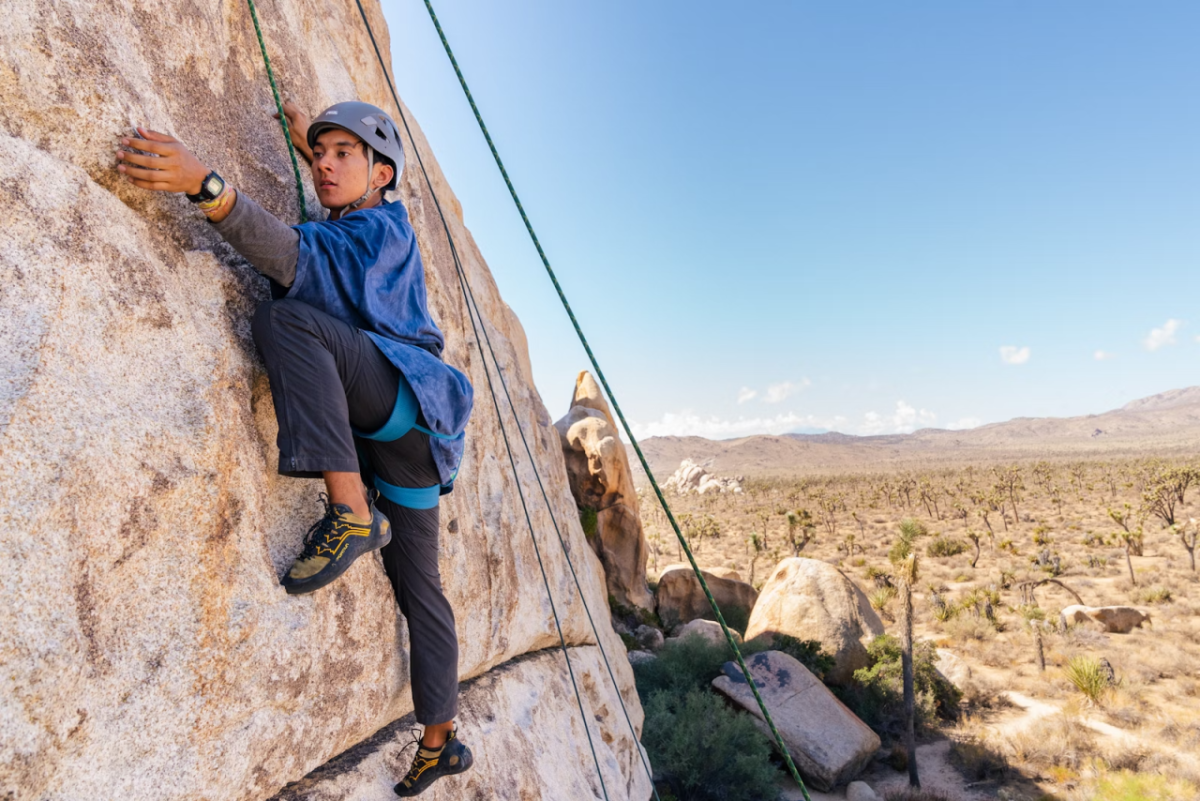 Child climbing a rock wall