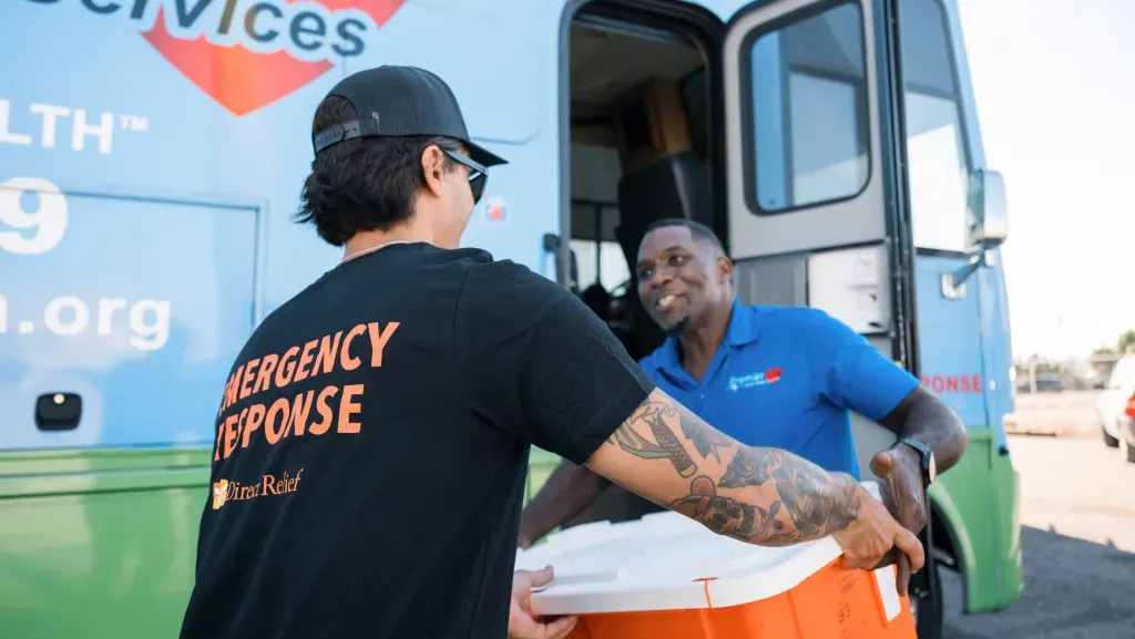 Direct Relief staff delivered medical aid to NC MedAssist in Charlotte, N.C., on Oct. 7, 2024, as part of Hurricane Helene response efforts. The statewide charitable pharmacy, which serves primarily uninsured patients, received tetanus vaccines, epinephrine, field medic packs, and other emergency supplies to support storm recovery and mobile outreach. (Photo by David Uttley for Direct Relief)