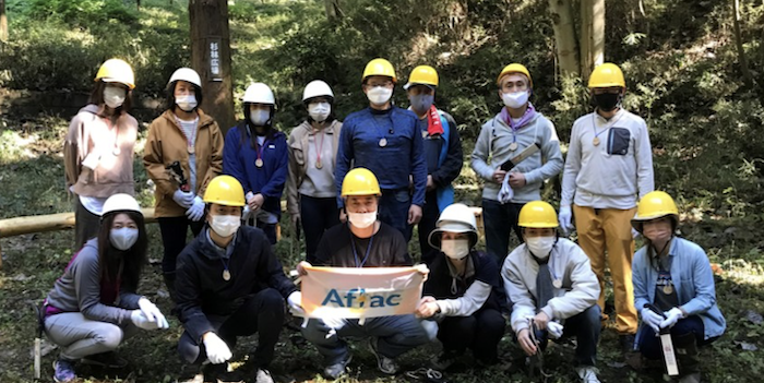 Aflac Japan volunteers pictured after conducting conservation tasks.