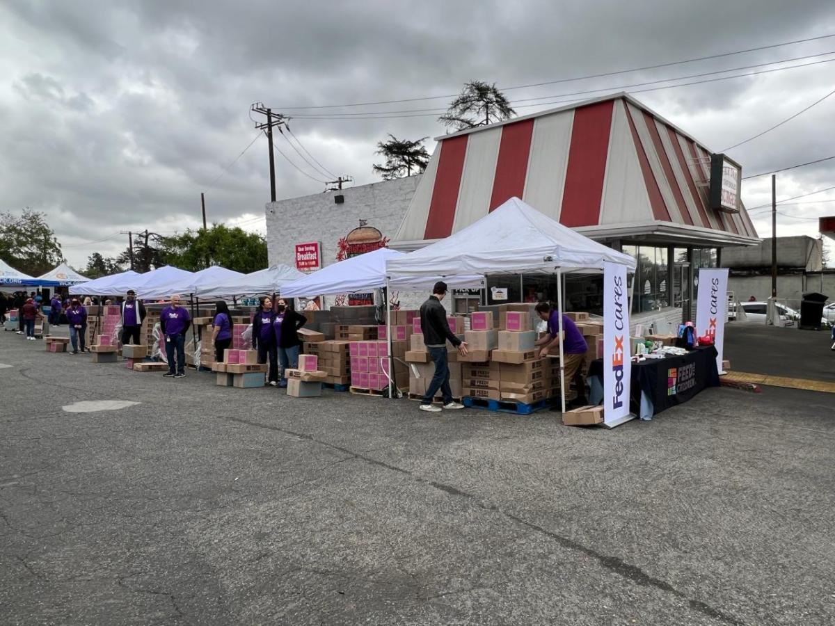 FedEx Cares tents set up to deliver goods.