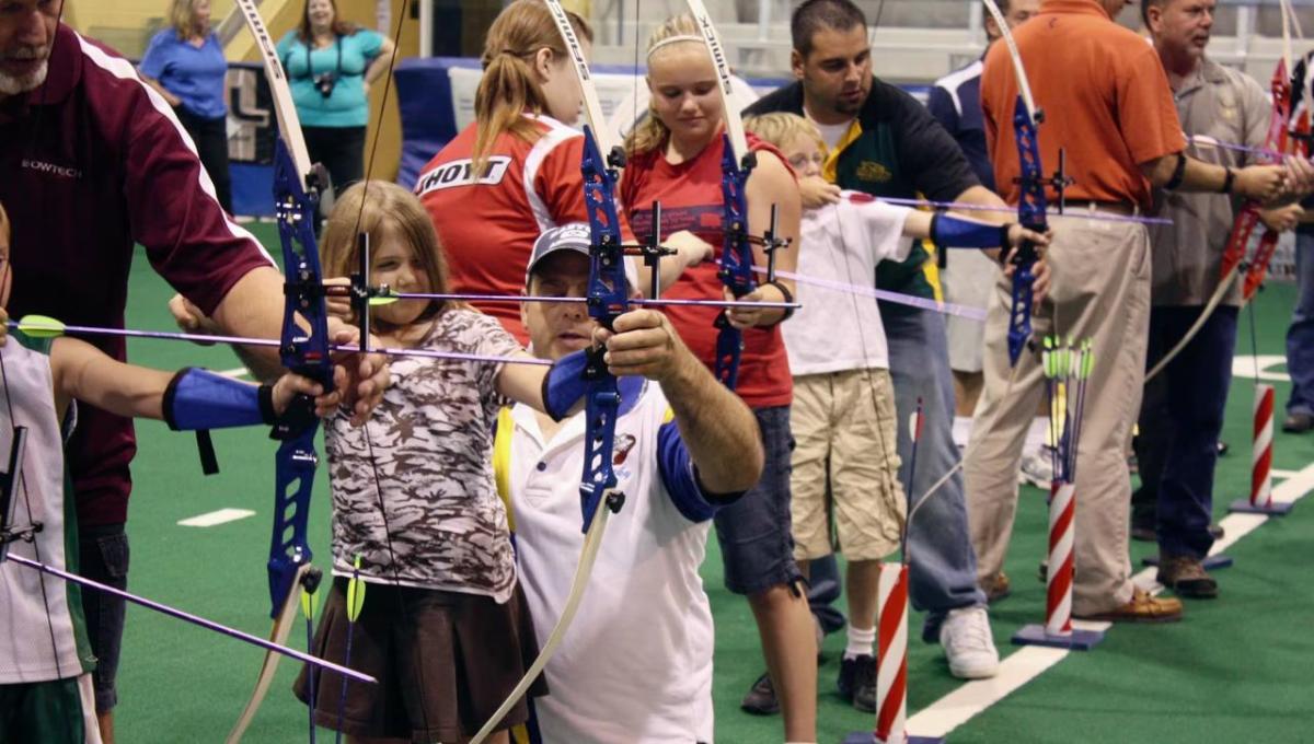 Children practicing archery 