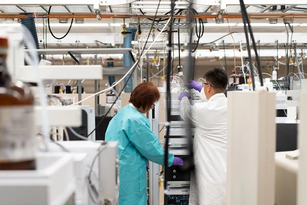 Workers in a biomedical lab