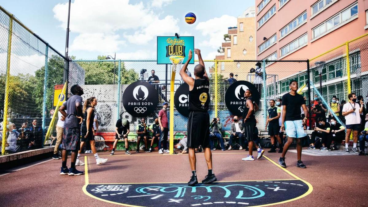 Group of people playing basketball