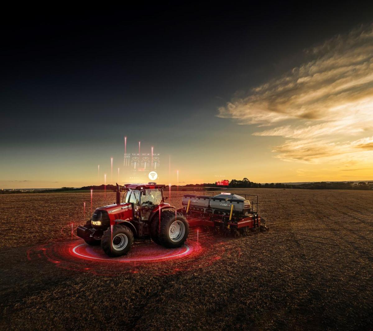 Red agricultural equipment in a crop field