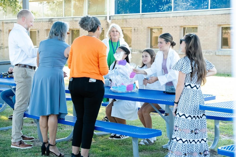 Students, teachers, and Chemours employees enjoy ribbon cutting festivities