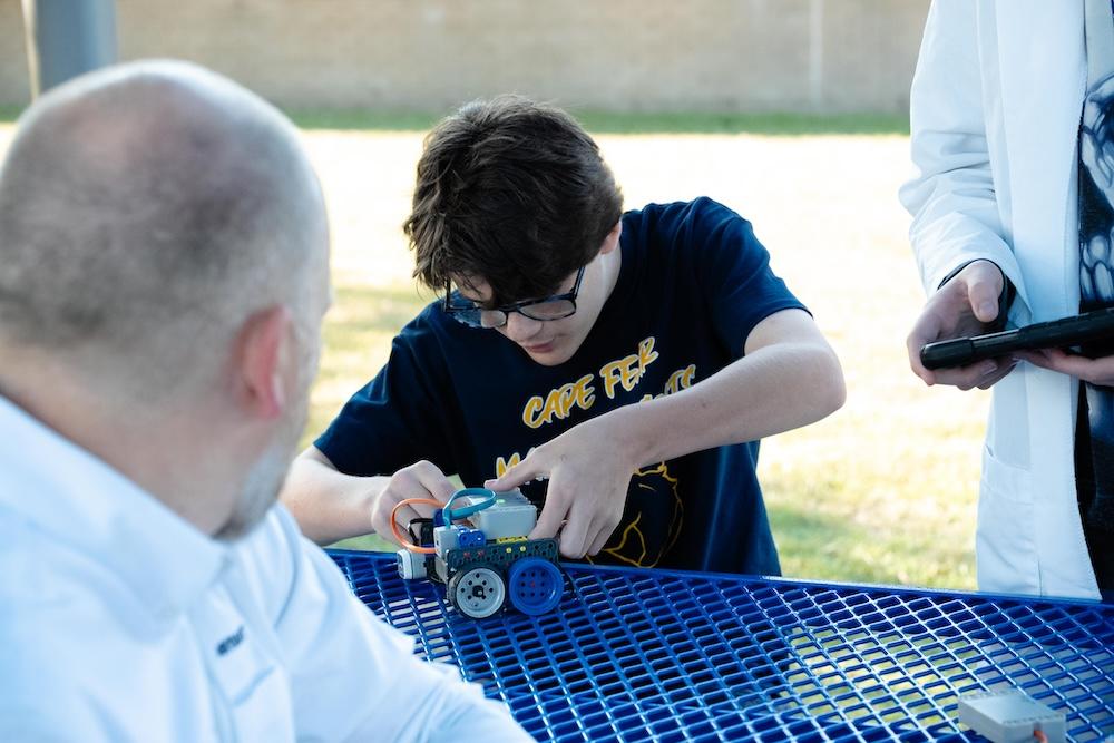 Student uses hands-on STEM activity