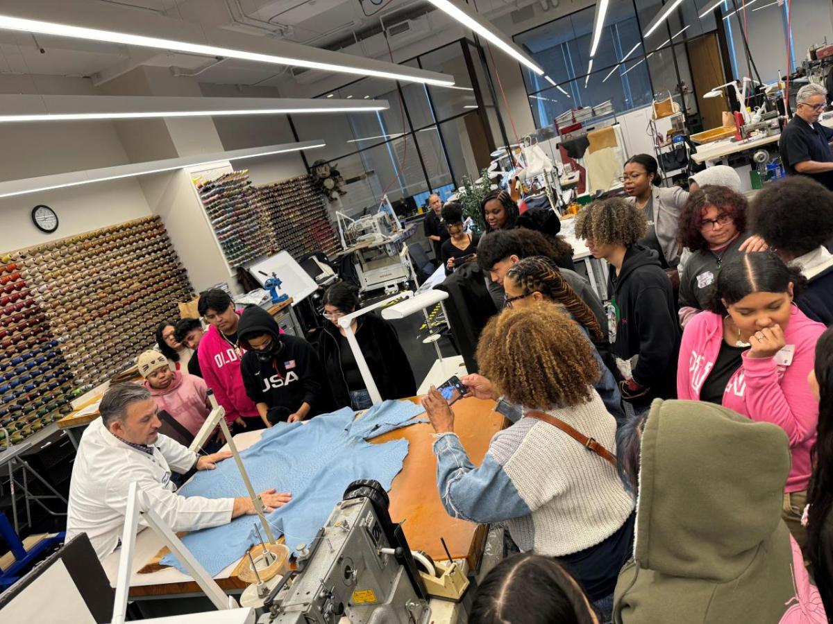 Students gathered around a table at Career Discovery Week at Tapestry HQ