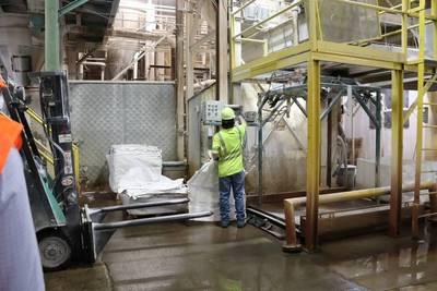 worker inside Covia plant
