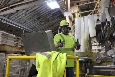 worker inside Covia plant