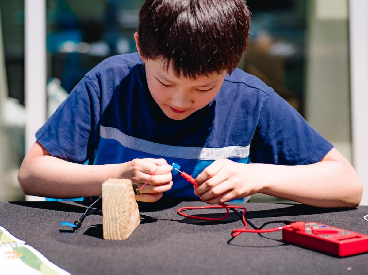 Boy working on science project