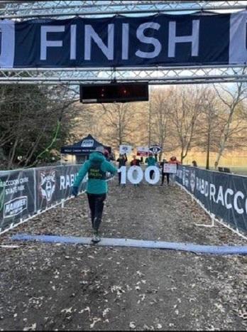 Lulu crossing the Rabid Raccoon 100 finish line.