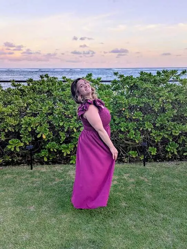 Danielle pictured in front of the sea.