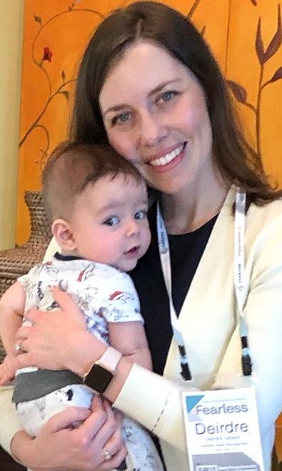 Deirdre with her son at a conference