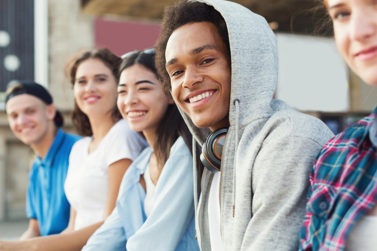 Group of seated young adults.