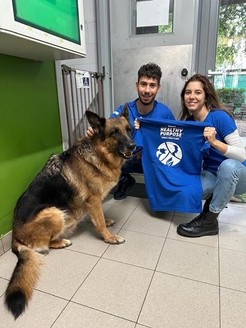 Elanco employees with dog 