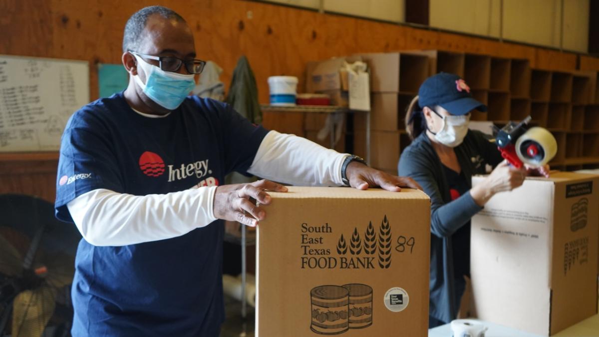 volunteers packing boxes