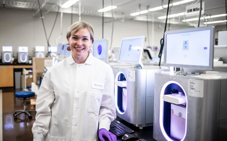 Illumina Associate Director of Scientific Research Erin Imsand with the new MiSeq i100 System. Photo by Kristy Walker.