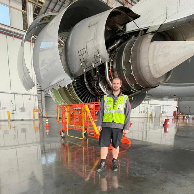 Felipe Pierri Schmidt stood in front of an engine 