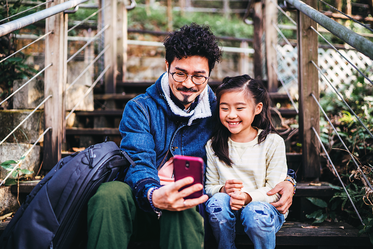 Father and Daughter on Phone