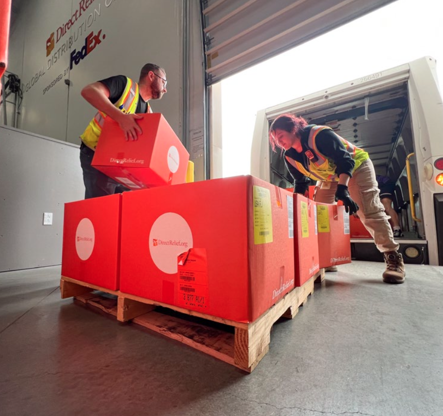 Relief supplies are loaded into a FedEx truck from the Direct Relief Global Distribution Center, sponsored by FedEx