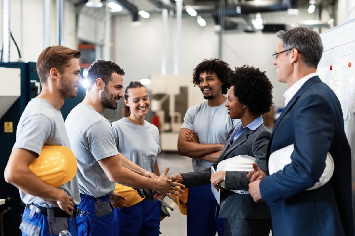 group of people holding rugby balls