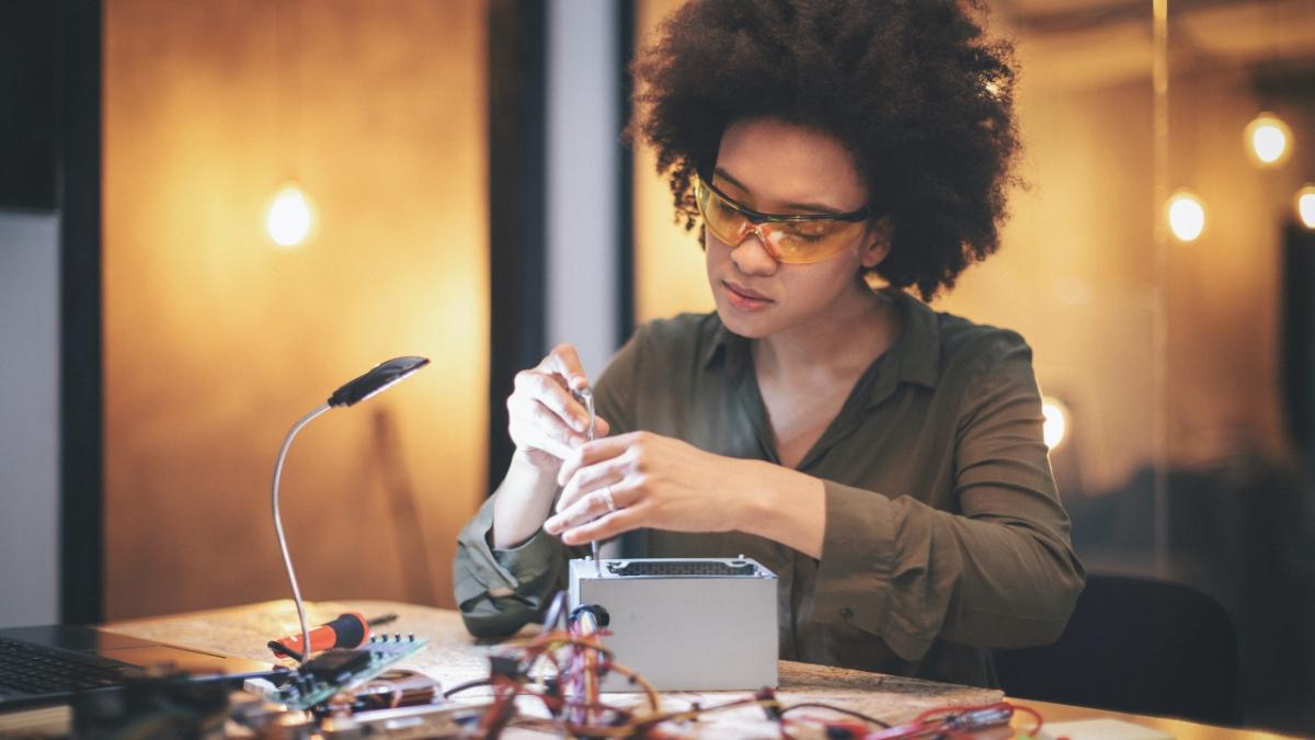 person assembling pieces