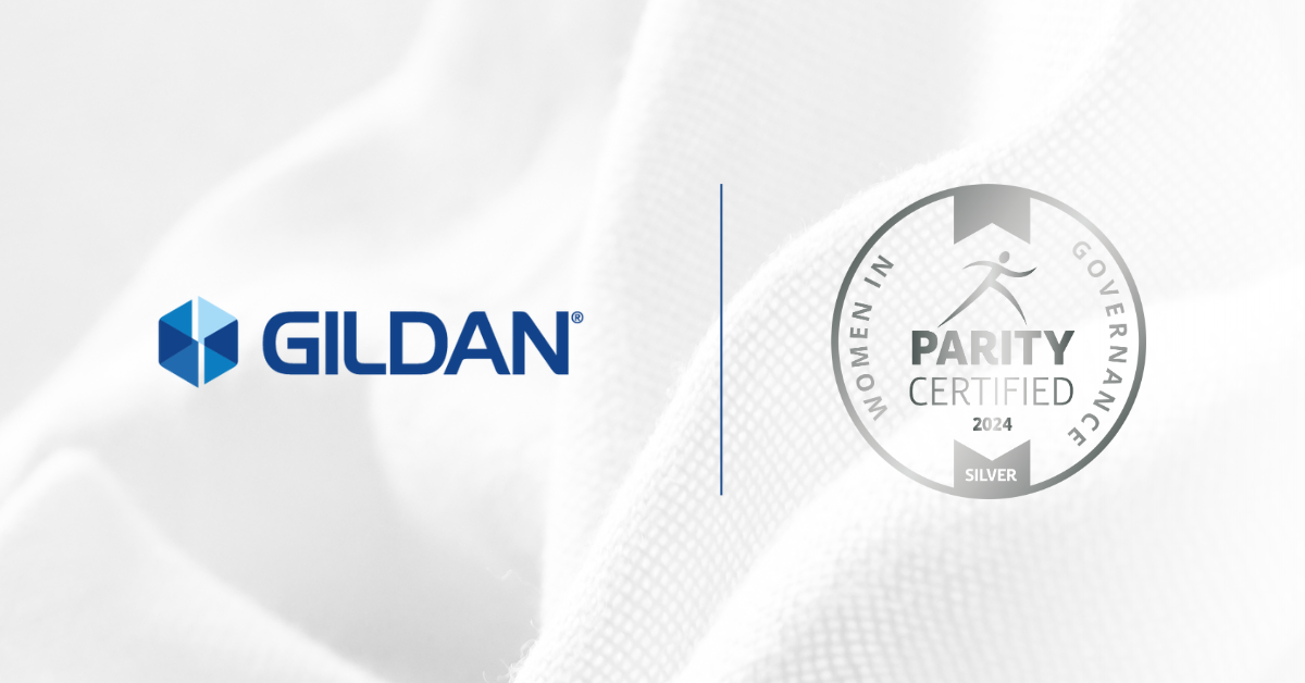 Gildan’s North American Operations Achieve Silver Level in the Women in Governance Parity Certification Gildan logo and Women in Governance Silver Level Parity Certified Logo against a white fabric backdrop