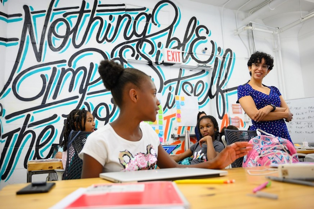 Class with graffiti art on the wall 