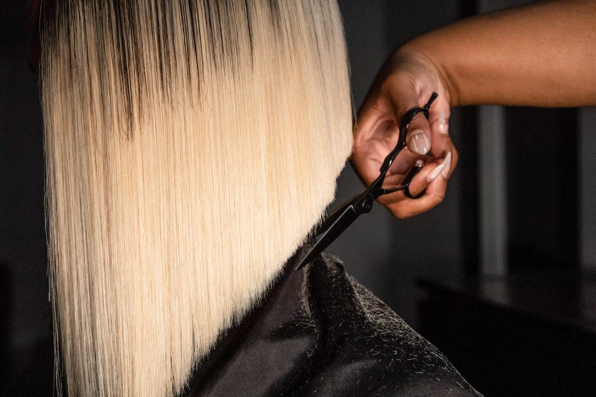 Detail of woman's haircut.