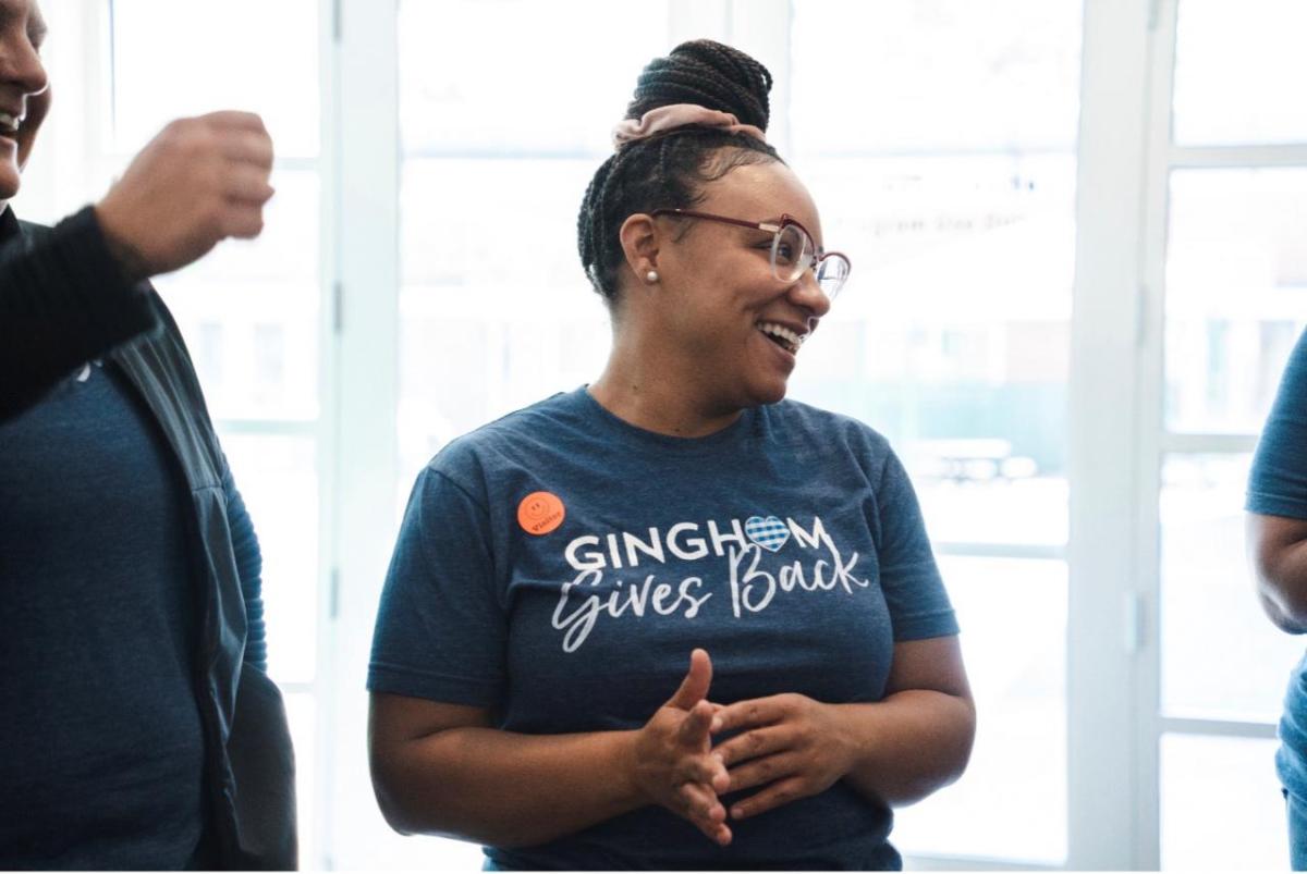 Volunteers laughing and talking together